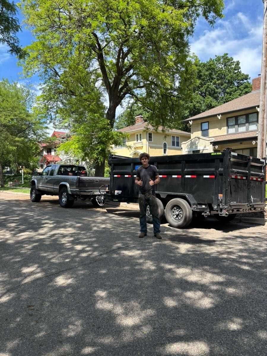 Jasper with the Dart Landscaping truck and dump trailer