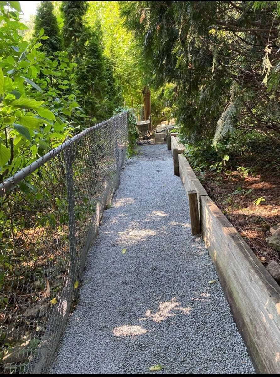 Gravel walkway with timber edging on a slope